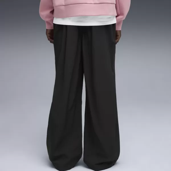  Pánske nohavice PUMA WARDROBE ESS OVERSIZED PARACHUTE PANTS WV OP 63206801 PUMA ČIERNA 