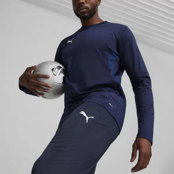  Nohavice PUMA TEAMGOAL TRAINING PANT 658639_06 PUMA NAVY/BIELA/PERZSKÁ MODRÁ 