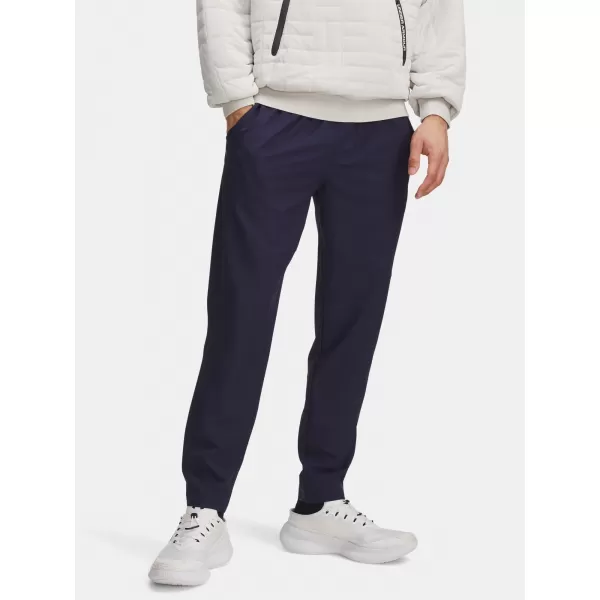  Pánske športové nohavice UNDER ARMOUR UA UNSTOPPABLE TAPERED PANTS 6003861-410 MODRÁ 