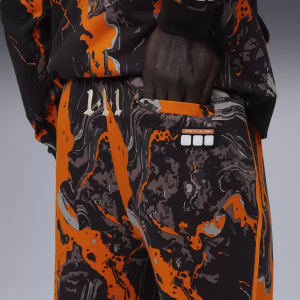  Pánske tepláky PUMA LAFRANCE HEEM ERA SWEAT 63247201 ORANŽOVÁ GLO/AOP 