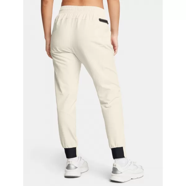  Dámske tepláky UNDER ARMOUR UA UNSTOPPABLE JOGGER 1376926-110 BIELA 