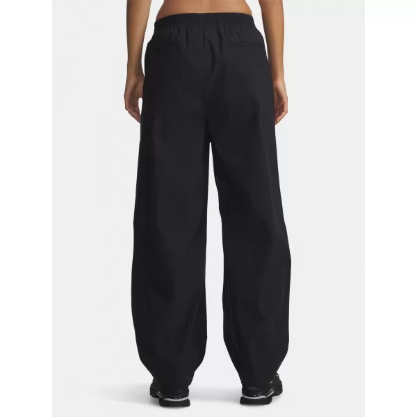  Dámske športové nohavice UNDER ARMOUR UA UNSTOPPABLE WVN PLEAT PT 6007027-001 ČIERNA 
