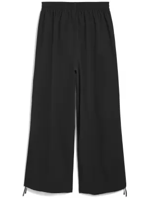 Pánske nohavice PUMA WARDROBE ESS OVERSIZED PARACHUTE PANTS WV OP 63206801 PUMA ČIERNA