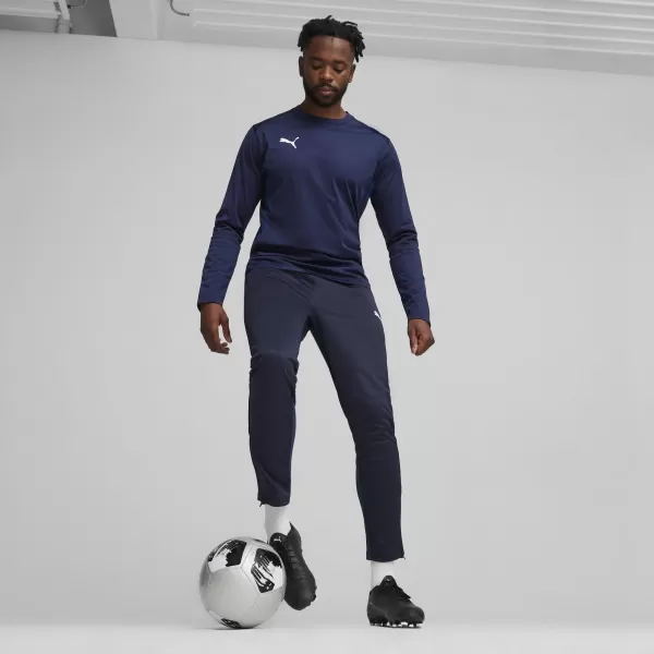  Nohavice PUMA TEAMGOAL TRAINING PANT 658639_06 PUMA NAVY/BIELA/PERZSKÁ MODRÁ 