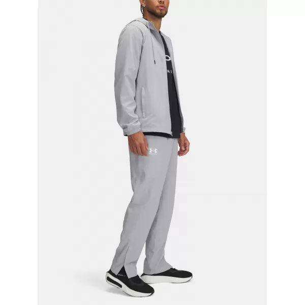  Pánske športové nohavice UNDER ARMOUR UA RIVAL WVN WINDBREAKER PN 1390150-011 SIVÁ 