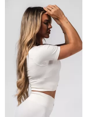 Tvarujúci bezšvový crop top FLOW SEAMLESS 499 CREAM Nebbia