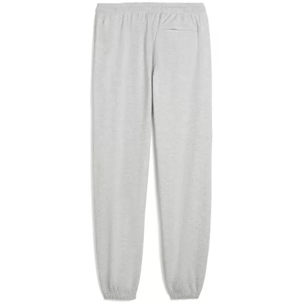  Pánske tepláky PUMA M GRAPHIC FRENCH TERRY JOGGER 52770304 SVETLOSIVÝ VRES 