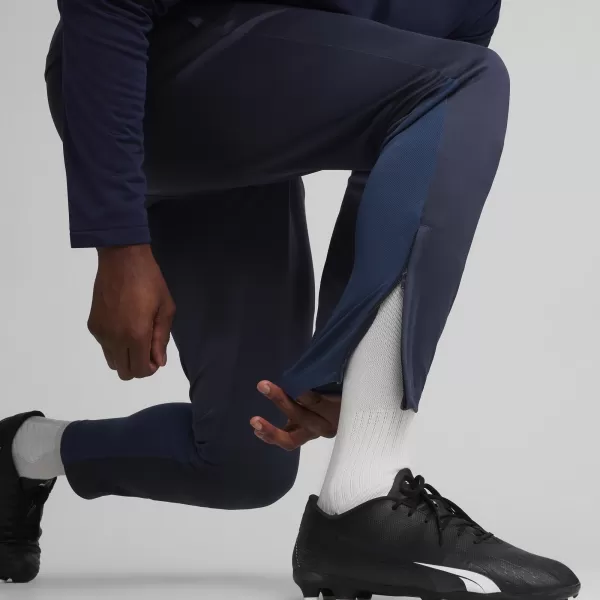  Nohavice PUMA TEAMGOAL TRAINING PANT 658639_06 PUMA NAVY/BIELA/PERZSKÁ MODRÁ 