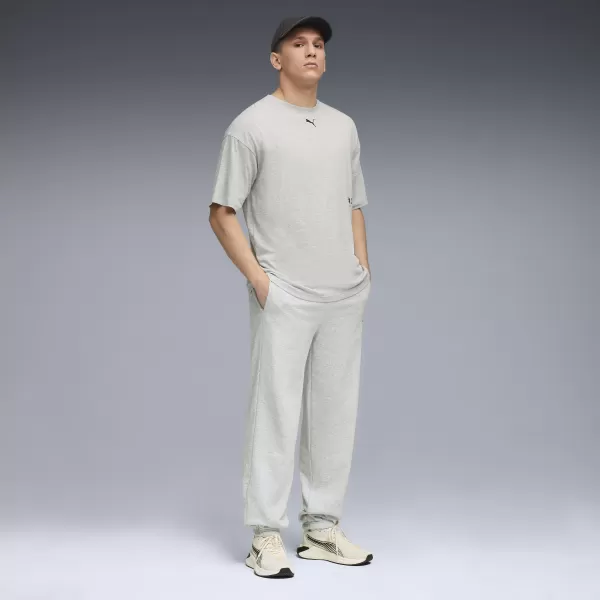  Pánske tepláky PUMA M GRAPHIC FRENCH TERRY JOGGER 52770304 SVETLOSIVÝ VRES 