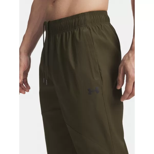  Pánske športové nohavice UNDER ARMOUR UA UNSTPBLE WOVEN TX TAPER 6003865-308 ZELENÁ 