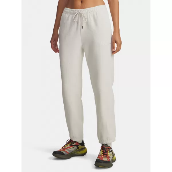  Dámske tepláky UNDER ARMOUR ICON TERRY VARSITY JOGGER 6004858-110 BIELA 
