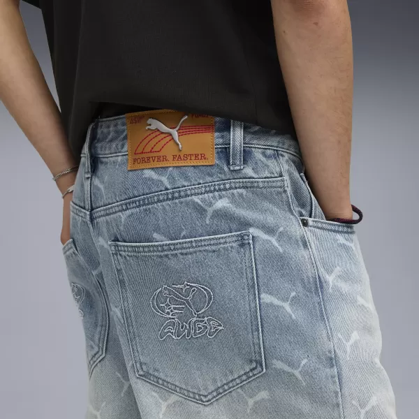  Pánske nohavice PUMA ROCKY LASER MONOGRAM DENIM 633428-01 VYBLEDNUTÝ DENIM/AOP 