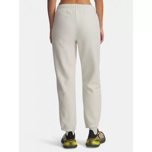  Dámske tepláky UNDER ARMOUR ICON TERRY VARSITY JOGGER 6004858-110 BIELA 