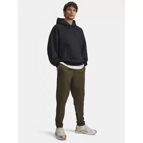  Pánske športové nohavice UNDER ARMOUR UA UNSTOPPABLE TAPERED PANTS 6003861-308 ZELENÁ 