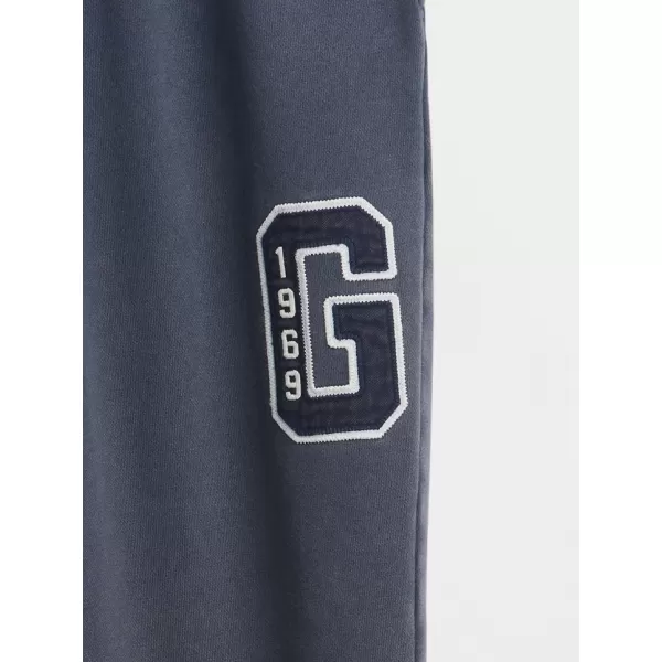  Pánske tepláky GAP LOGO SWEATPANTS 853431-00 NEW CLASSIC NAVY 