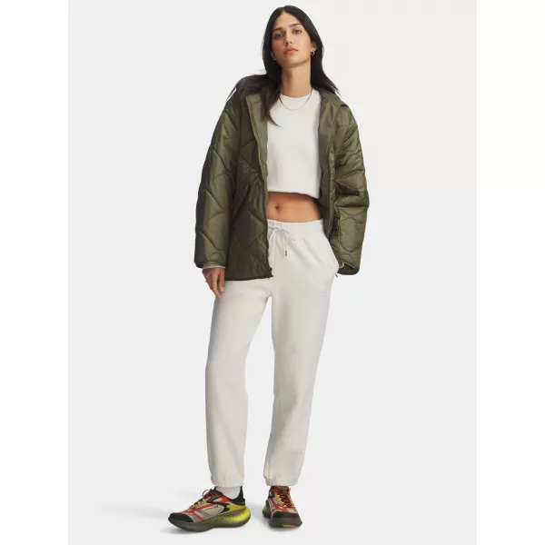  Dámske tepláky UNDER ARMOUR ICON TERRY VARSITY JOGGER 6004858-110 BIELA 
