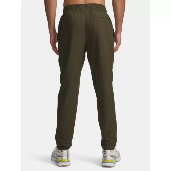  Pánske športové nohavice UNDER ARMOUR UA UNSTOPPABLE TAPERED PANTS 6003861-308 ZELENÁ 