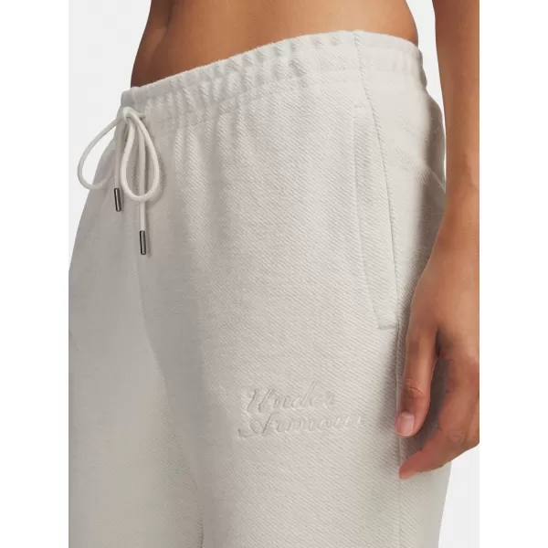  Dámske tepláky UNDER ARMOUR ICON TERRY VARSITY JOGGER 6004858-110 BIELA 