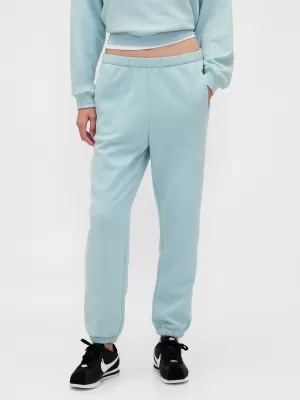 Dámske tepláky GAP JOGGER SWEATPANTS 765568-67 SVETLÁ JESEŇ