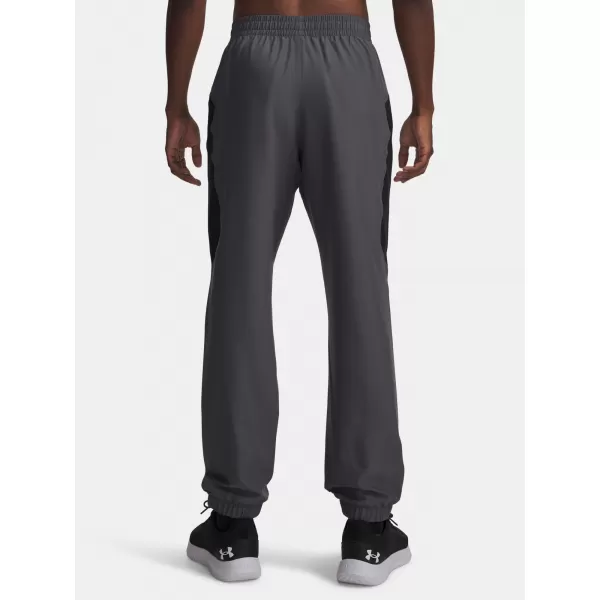  Pánske športové nohavice UNDER ARMOUR TECH SPORT PANT 6011268-025 ŠEDÁ 