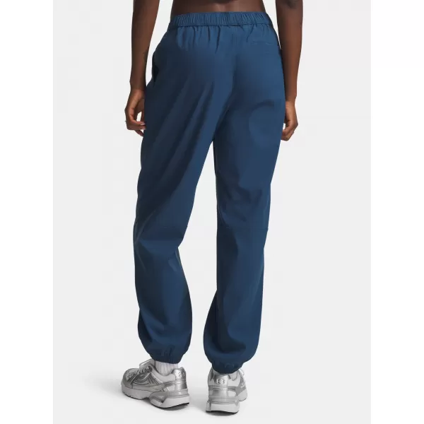  Dámske tepláky UNDER ARMOUR UNSTOPPABLE WVN JOGGER 6011400-498 MODRÁ 