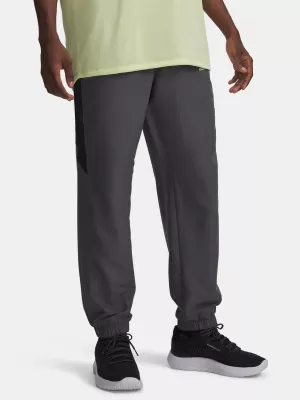 Pánske športové nohavice UNDER ARMOUR TECH SPORT PANT 6011268-025 ŠEDÁ