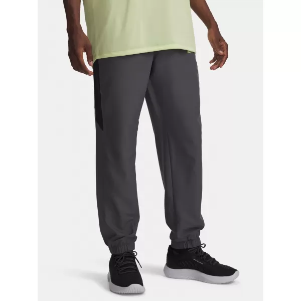  Pánske športové nohavice UNDER ARMOUR TECH SPORT PANT 6011268-025 ŠEDÁ 