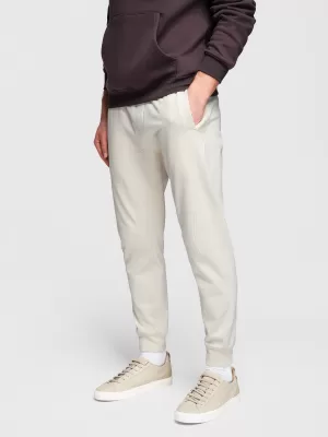 Pánske tepláky OMBRE OM-PABS-0305 CREAM