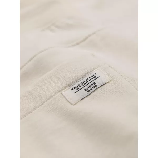  Pánske tepláky OMBRE OM-PABS-0305 CREAM 