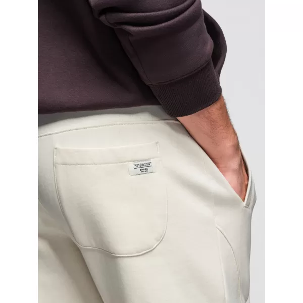  Pánske tepláky OMBRE OM-PABS-0305 CREAM 