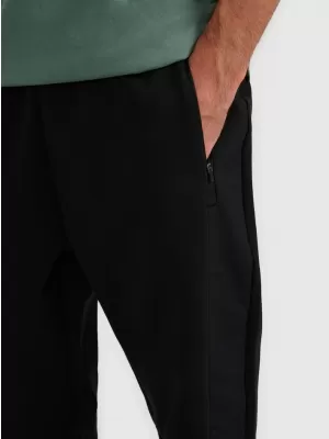Pánske nohavice 4F WAW25TTROM1252 DEEP BLACK
