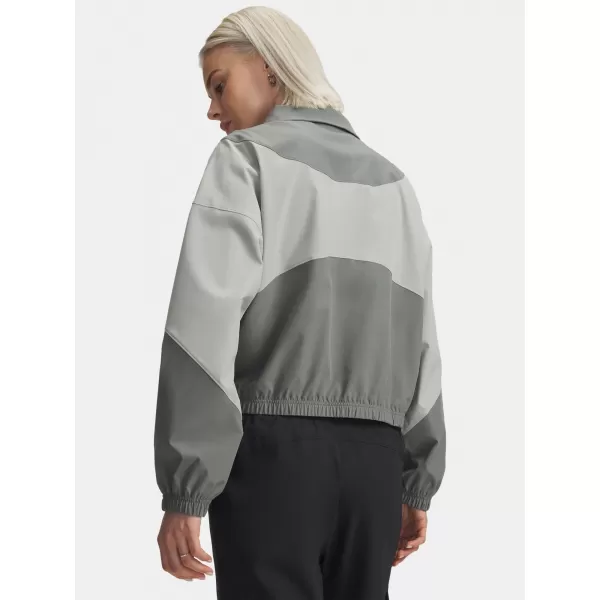  Dámska bunda UNDER ARMOUR RIVAL WOVEN JACKET 1389631-709 WHITE 