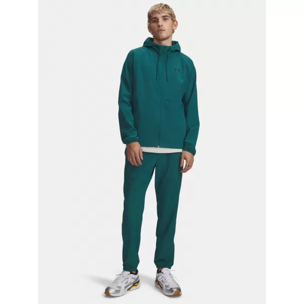  Pánske tepláky UNDER ARMOUR VIBE WOVEN JOGGER 1386557-338 ZELENÁ 