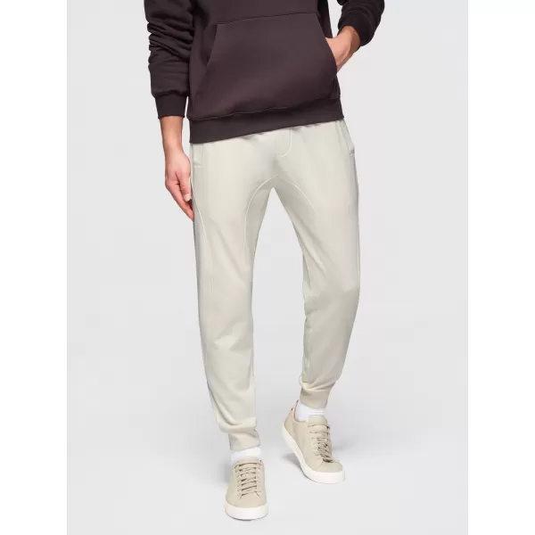  Pánske tepláky OMBRE OM-PABS-0305 CREAM 