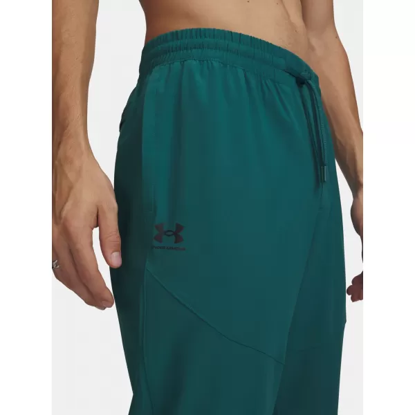  Pánske tepláky UNDER ARMOUR VIBE WOVEN JOGGER 1386557-338 ZELENÁ 