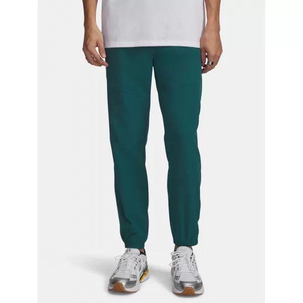 Pánske tepláky UNDER ARMOUR VIBE WOVEN JOGGER 1386557-338 ZELENÁ 