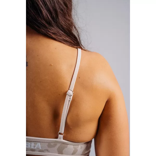  Medium support športová podprsenka s leopardím vzorom NEBBIA PRIMAL 854 CREAM LEOPARD 