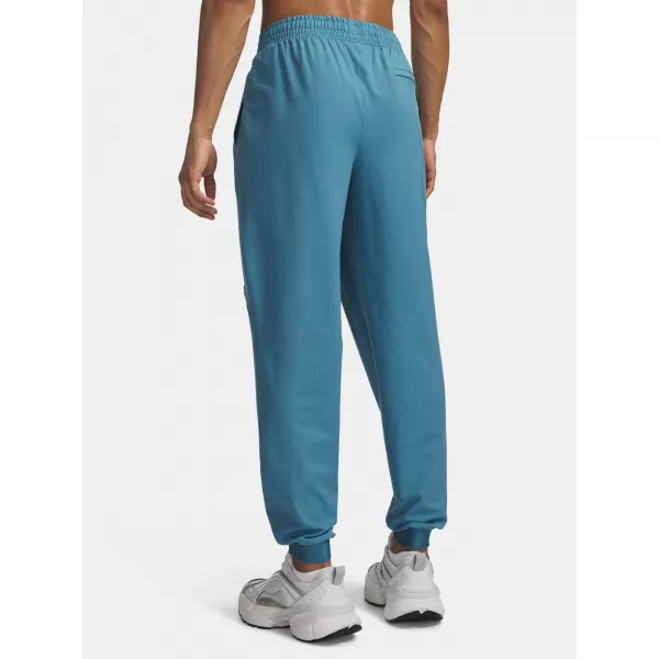 Pánske tepláky UNDER ARMOUR UNSTOPPABLE WOVEN JOGGER 1388823-466 MODRÁ 