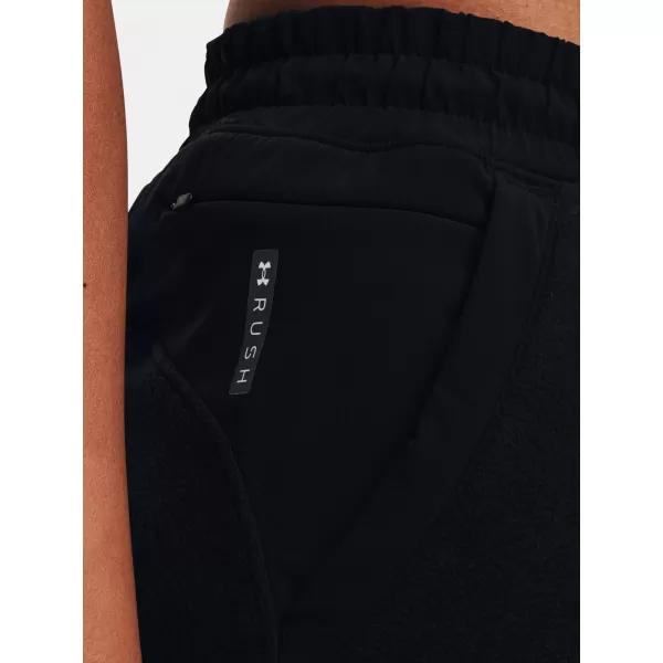  Dámske nohavice UNDER ARMOUR UA RUSH FLEECE PANT 1365775-001 ČIERNA 