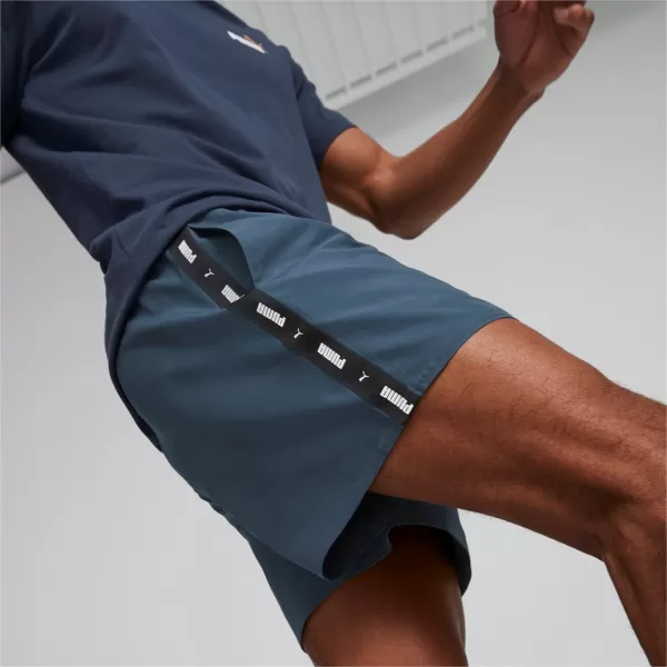  Pánske šortky PUMA ESS+ TAPE WOVEN SHORTS 849043-16 BLUE 