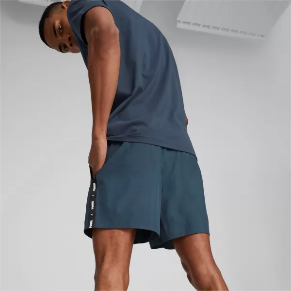  Pánske šortky PUMA ESS+ TAPE WOVEN SHORTS 849043-16 BLUE 