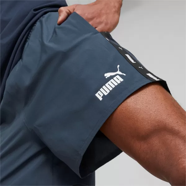  Pánske šortky PUMA ESS+ TAPE WOVEN SHORTS 849043-16 BLUE 