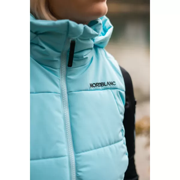  Dámska zimná vesta NORDBLANC SWEET NBWJL7946 SVETLO modrá 
