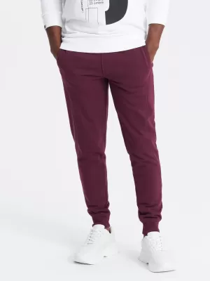 Pánske tepláky OMBRE OM-PABS-0174 GAŠTANOVÉ