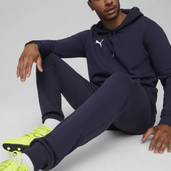  Nohavice PUMA TEAMGOAL CASUALS PANTS 658598_06 PUMA NAVY/PUMA WHITE 