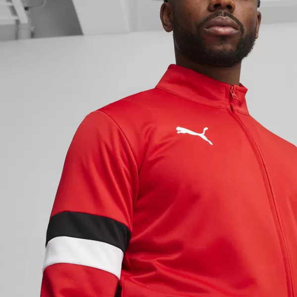  Stopka PUMA TEAMRISE TRACKSUIT 658653_01 PUMA RED/PUMA BLACK 