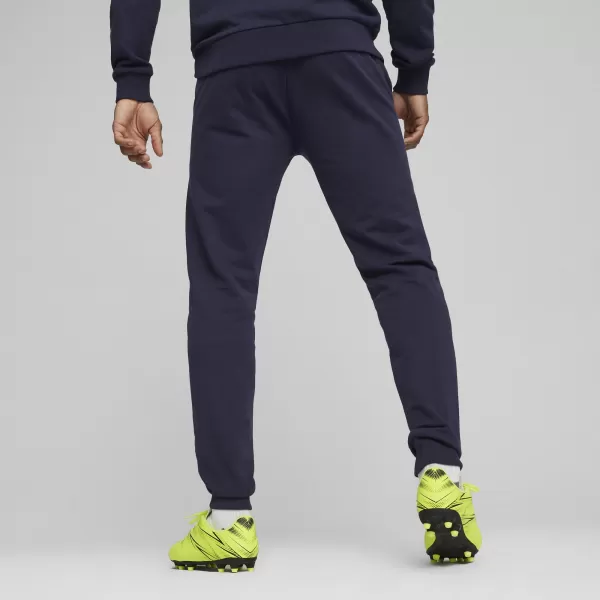  Nohavice PUMA TEAMGOAL CASUALS PANTS 658598_06 PUMA NAVY/PUMA WHITE 