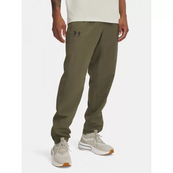  Pánske športové nohavice UNDER ARMOUR RIVAL WVN WINDBREAKER PN 1390150-390 ZELENÁ 