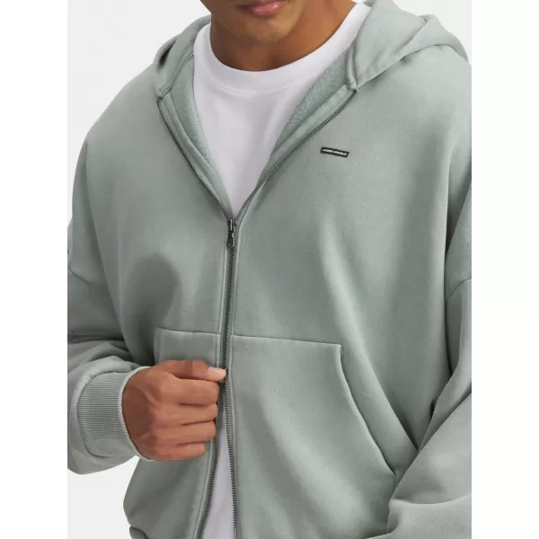  Pánska mikina UNDER ARMOUR ICON HWT FLEECE WASH FZ 6000651-348 ZELENÁ 