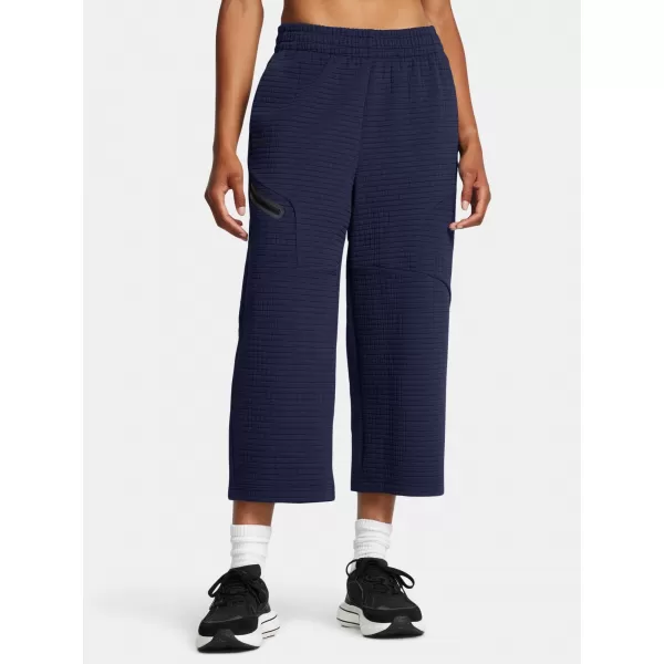  Dámske športové nohavice UNDER ARMOUR UNSTOPPABLE FLC GRID CROP 1386492-410 MODRÁ 